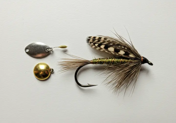 The basics of a fishing fly, including its definition and how it differs from traditional lures.