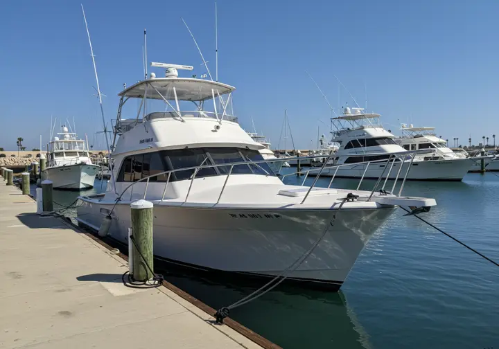 A fishing charter boat docked in La Paz, illustrating the available charter options for anglers.