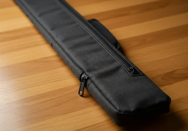 Durable canvas fishing rod bag, protecting fishing gear.