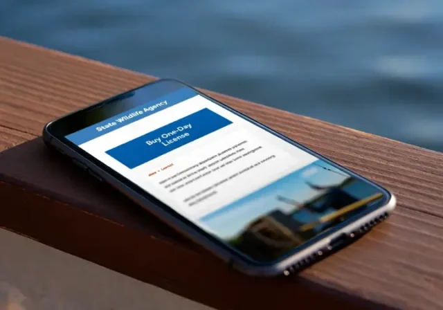 Smartphone screen showing an official state website page for purchasing an instant one-day fishing license online.