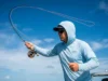 Fly Line Physics: Maximizing Loop Energy Angler casting a Sage fly rod with a tight loop of Scientific Anglers fly line on a saltwater flat.