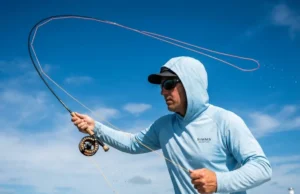 Fly Line Physics: Maximizing Loop Energy Angler casting a Sage fly rod with a tight loop of Scientific Anglers fly line on a saltwater flat.