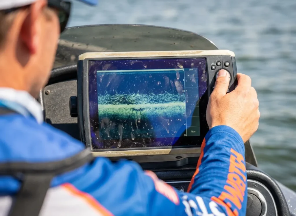 Close up of a fish finder screen showing a horizontal band of interference indicating the thermocline.