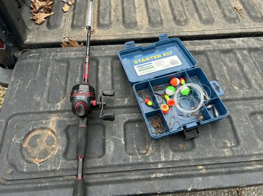 A real kids fishing combo next to a padded starter kit box comparing value on a truck tailgate