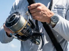 Reel Drag Systems Heat Physics: Data-Backed Analysis A Shimano Stella SW spinning reel emitting heat waves while a fisherman in a Columbia PFG shirt fights a large tuna.