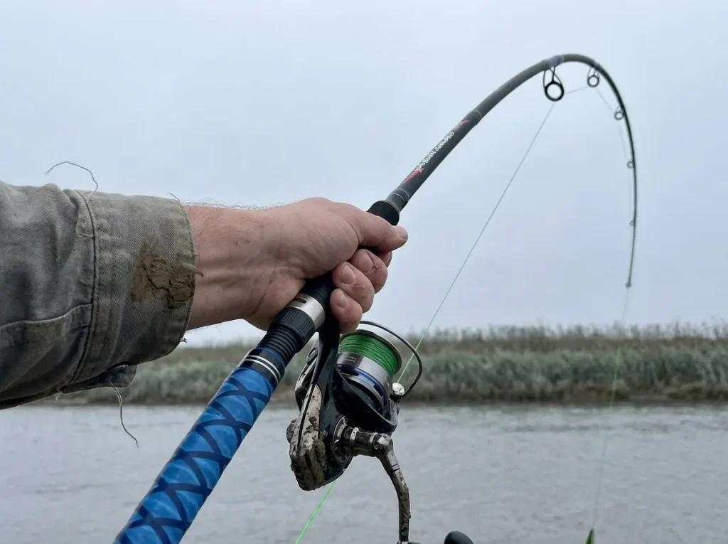 A carbon rod loaded into a deep bend showing action and power versus modulus