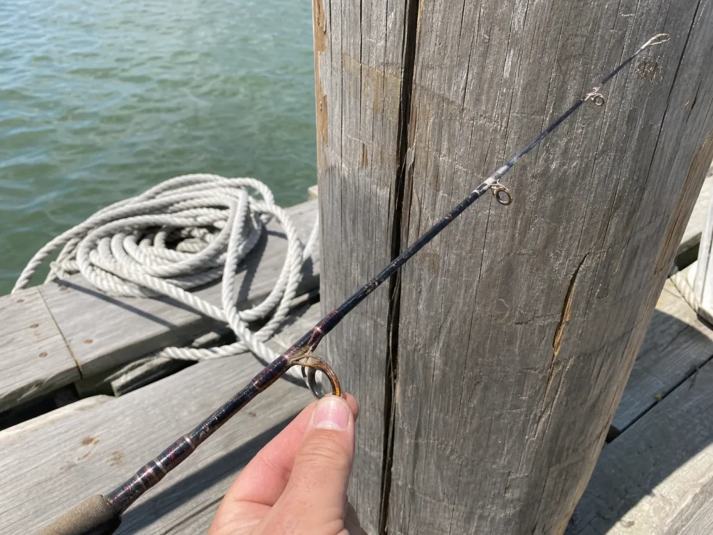 Corroded rod guides and a sun-faded blank showing normal wear a warranty does not cover