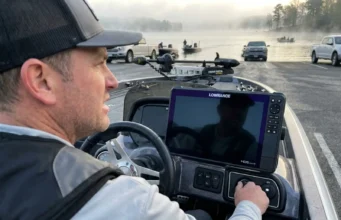 Dead Boat Battery Spring? Here’s What Went Wrong Last Fall Angler turning key on bass boat with dead battery at spring boat ramp