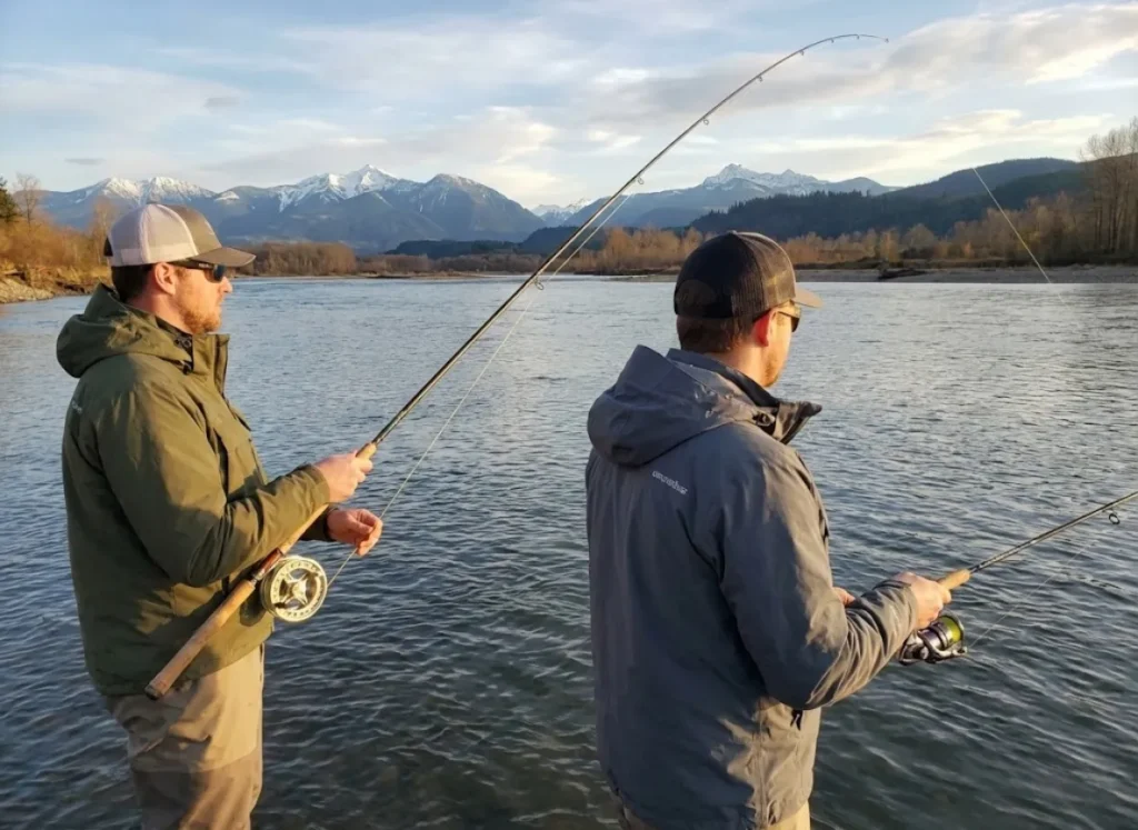 Centerpin and spinning anglers float fishing for steelhead, comparing gear systems