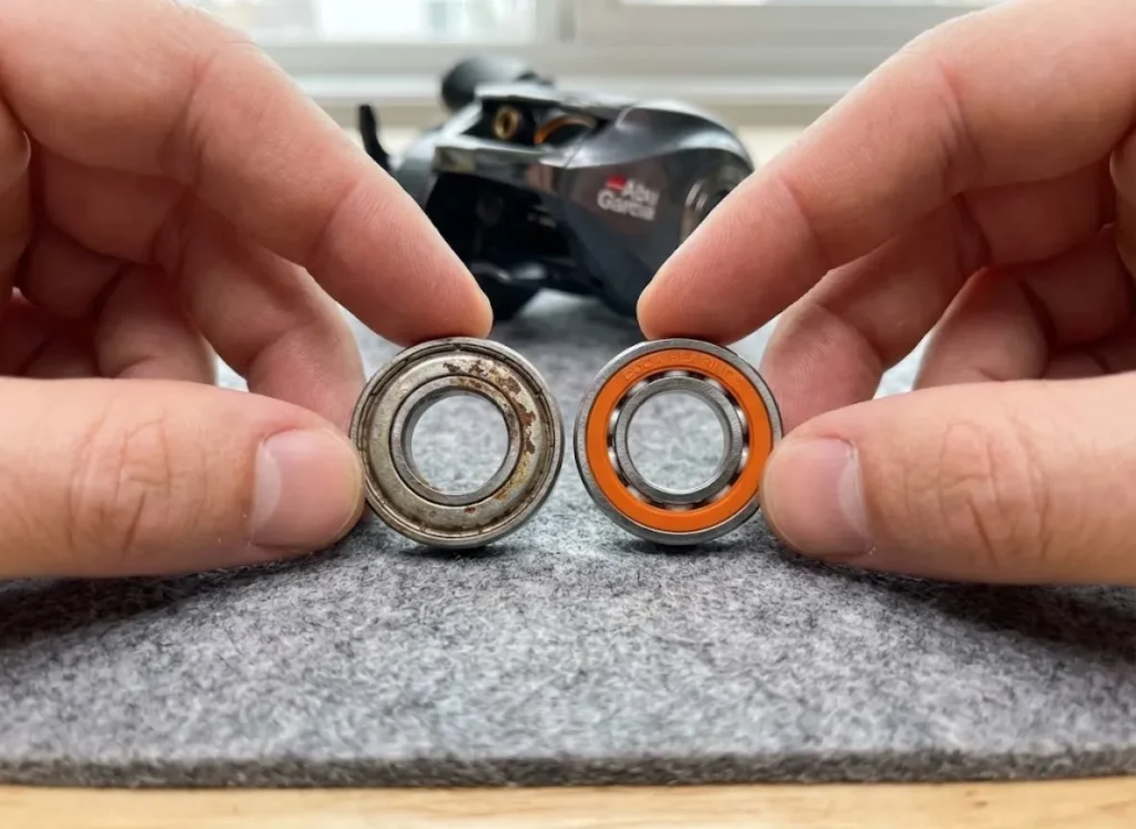 Corroded stainless vs clean ceramic fishing reel bearings side by side comparison