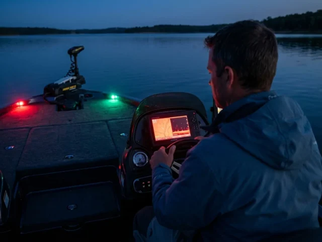 night-fishing-boat-safety-navigation-gear Night fishing boat safety with GPS navigation and proper running lights on reservoir