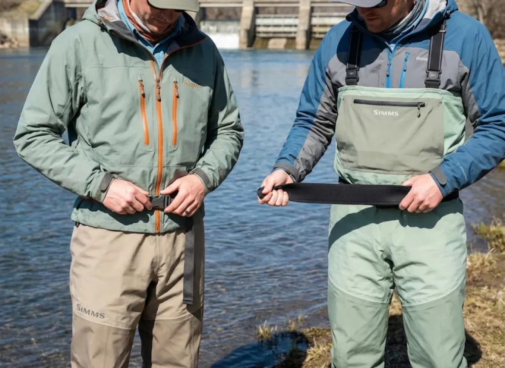 Comparison of webbing wading belt cinched tight versus stretchy neoprene belt showing safety difference