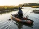 Best Kayak Rod Holders Flush Mount — What We’d Buy Kayak angler trolling with flush mount rod holders installed on fishing kayak deck