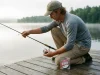 What Fishing Line for Beginners? Mono, Hands Down Beginner spooling monofilament fishing line onto a spinning reel at a quiet lake dock at dawn