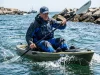 Kayak Hull Design Explained: Why Stability Ruins Your Speed Angler struggling to paddle wide kayak