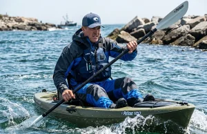 Kayak Hull Design Explained: Why Stability Ruins Your Speed Angler struggling to paddle wide kayak