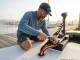 Wiring a 24V Trolling Motor System the ABYC Way Marine technician wiring a Minn Kota 24V trolling motor system using Ancor tinned copper wire at a sunny dock.