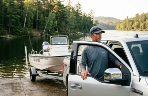 Boat Ramp Loading Technique the Physics Behind It Analytical angler executing proper boat ramp loading technique with a Boston Whaler
