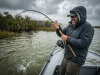 What 11,000 Newtons of Drum Fish Bite Force Means for Anglers Angler fighting black drum rod bent showing how drum fish use pharyngeal teeth to crush shells