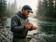 How Fish Smell: The Fluid Dynamics of Bait Selection Angler applying water-soluble scent to a drift rig on a misty riverbank demonstrating how fish smell bait