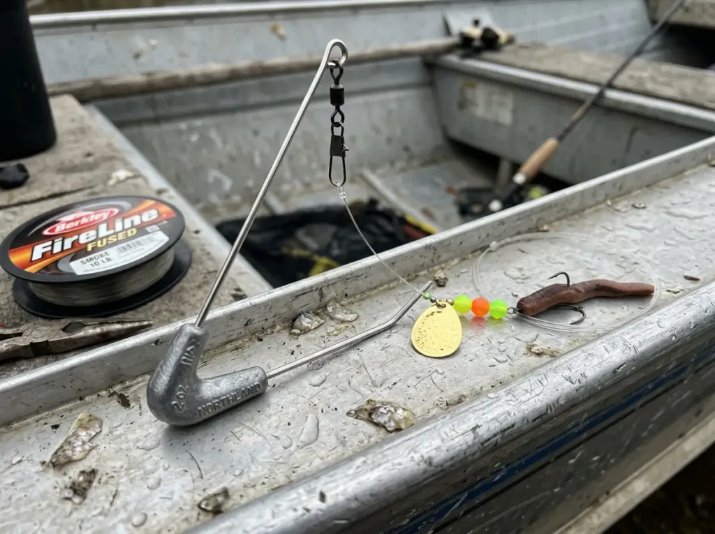 Close-up of bottom bouncer wire arm weight and spinner harness rigged