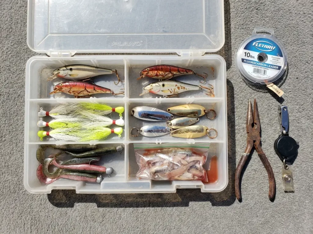 Tackle box with spoons jigs and Rapala lures rigged for Lake Powell fishing