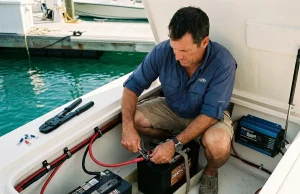 How to Install an Onboard Marine Battery Charger Right Angler installing an onboard marine battery charger in a center console boat