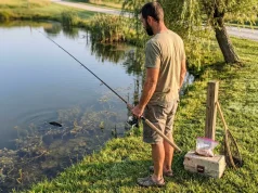 Stop Fishing Deep — Summer Carp Want the Shallows Angler sight-fishing for carp in shallow summer water with polarized sunglasses and light tackle