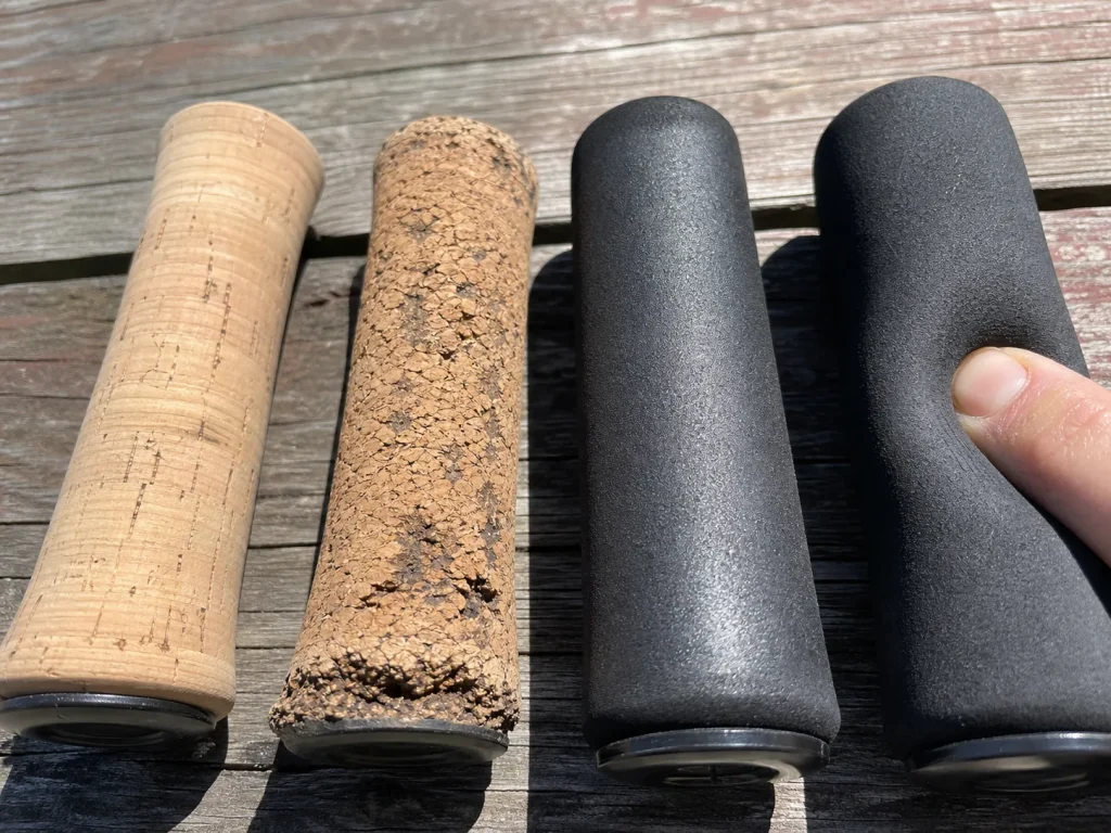 Close-up comparing clean AAA-grade cork against filler-packed cheap cork and dense versus soft EVA grips